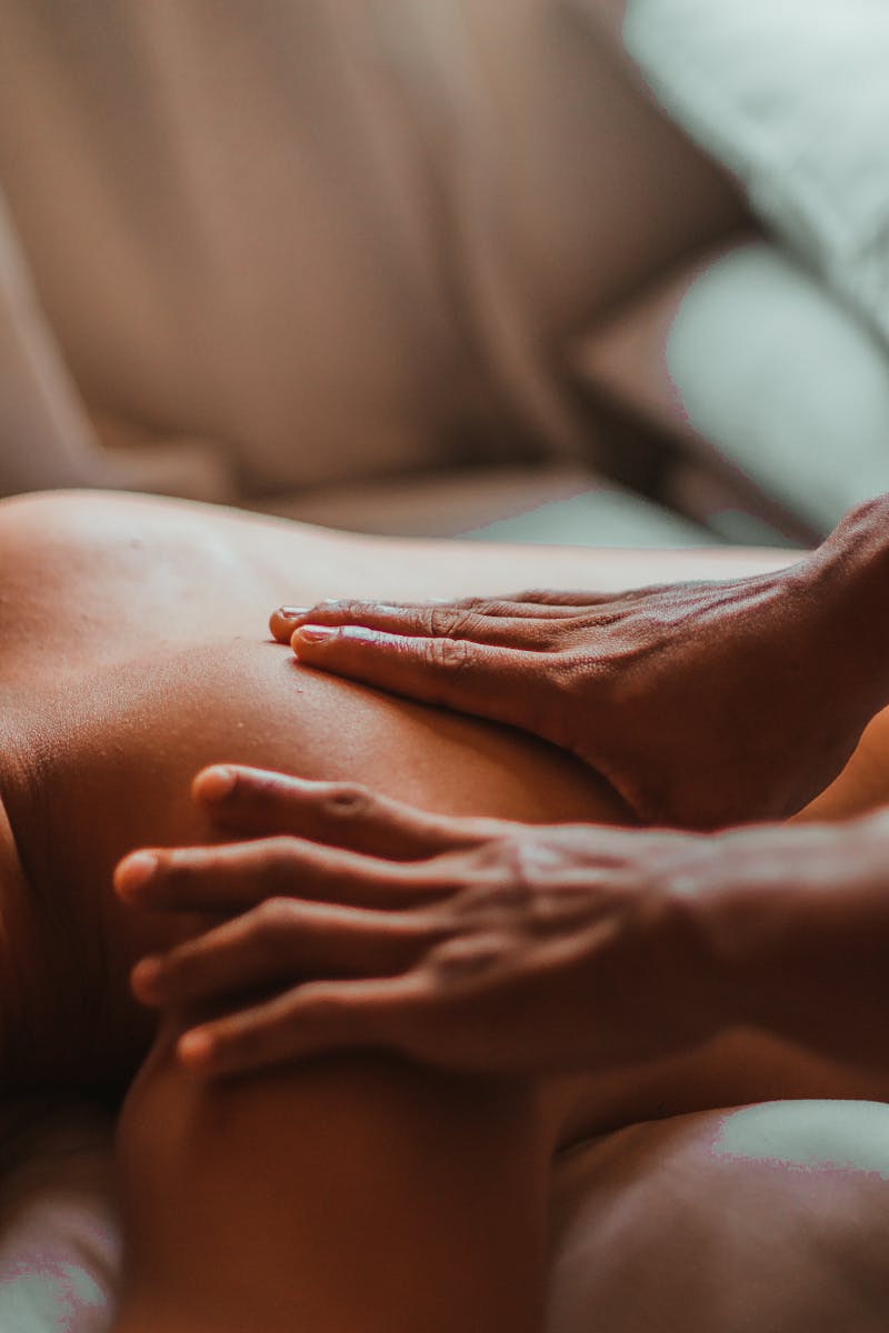 A soothing back massage session in a spa setting, focusing on wellness and relaxation.